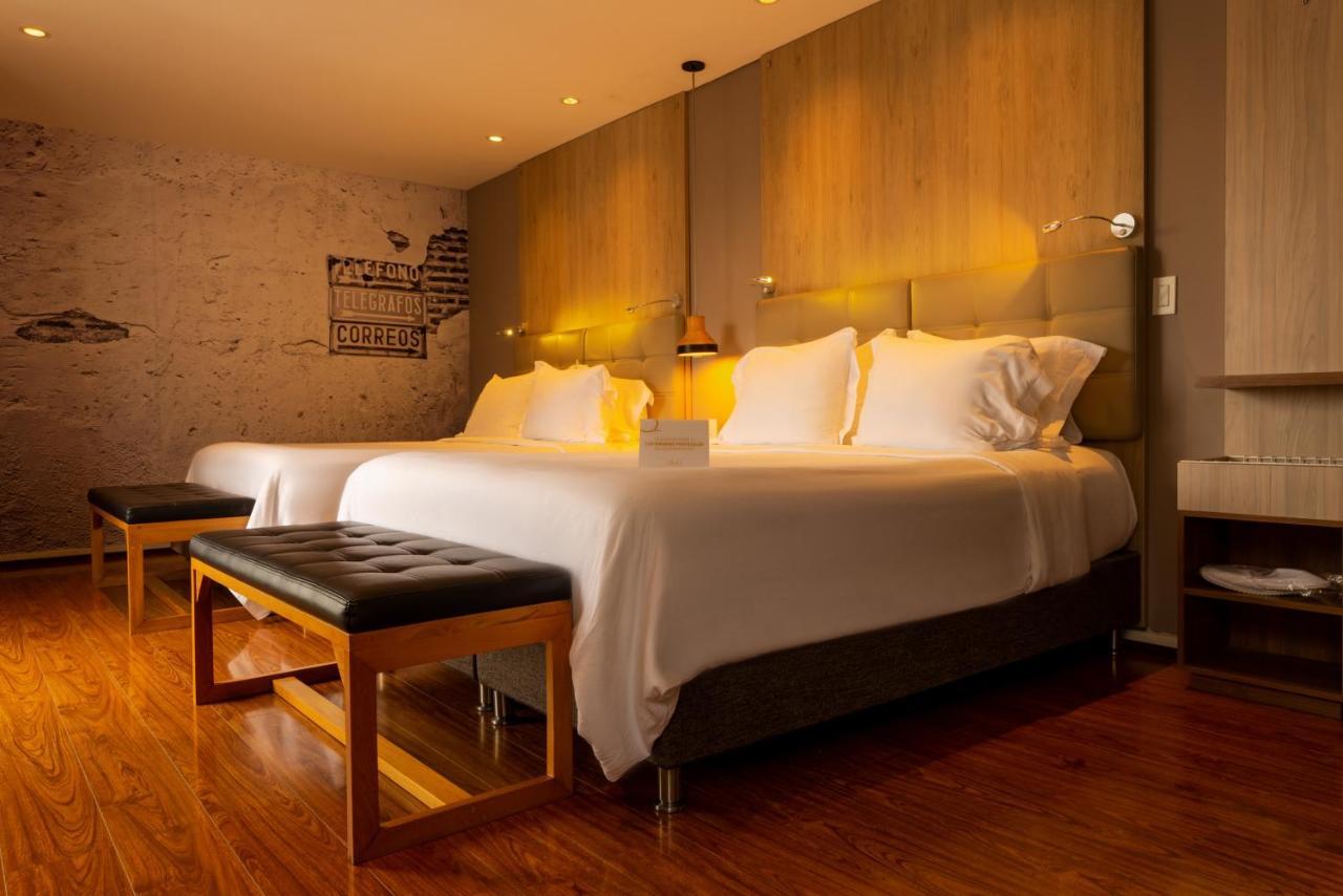 Quo Quality Hotel مانيزاليس المظهر الخارجي الصورة A bedroom at the hotel