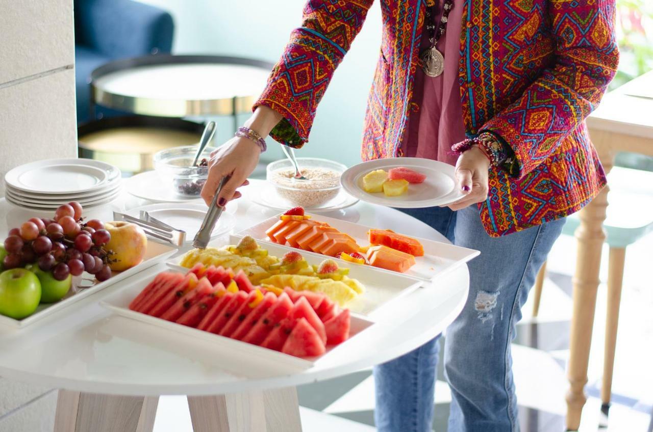 Quo Quality Hotel مانيزاليس المظهر الخارجي الصورة A buffet